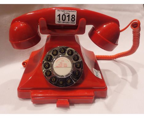 Red, GPO Carrington, push button telephone in 1920s styling with pull-out pad tray; compatible with modern telephone banking 