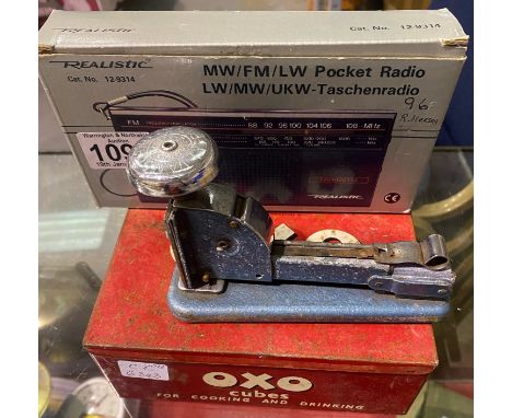 Working realistic pocket radio, vintage Oxo tin and a Vanguard stapler. P&amp;P Group 1 (£14+VAT for the first lot and £1+VAT