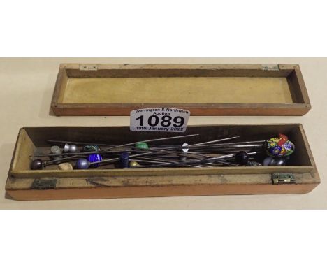 Box containing vintage hat pins of varying designs. P&amp;P Group 1 (£14+VAT for the first lot and £1+VAT for subsequent lots