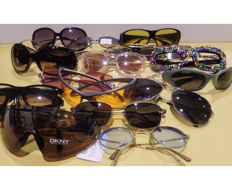 Twenty pairs of sunglasses and reading glasses including DKNY and River Island examples. P&amp;P Group 1 (£14+VAT for the fir