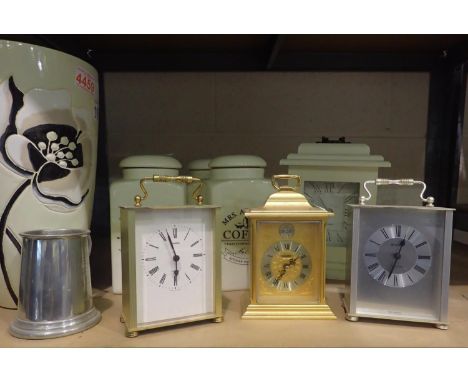 Selection of modern carriage clocks, three ceramic storage jars and a large ceramic vase. Not available for in-house P&amp;P,