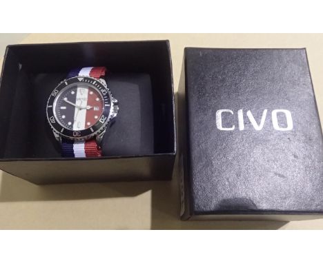 Gents sports fashion watch on canvas strap. P&amp;P Group 1 (£14+VAT for the first lot and £1+VAT for subsequent lots) 
