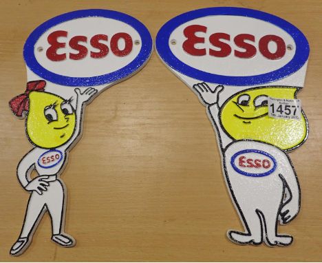 Cast Iron Esso man and women wall signs, L: 28 cm. P&amp;P Group 2 (£18+VAT for the first lot and £3+VAT for subsequent lots)