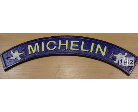 Cast iron Michelin banner wall sign, L: 40 cm. P&amp;P Group 2 (£18+VAT for the first lot and £3+VAT for subsequent lots) 