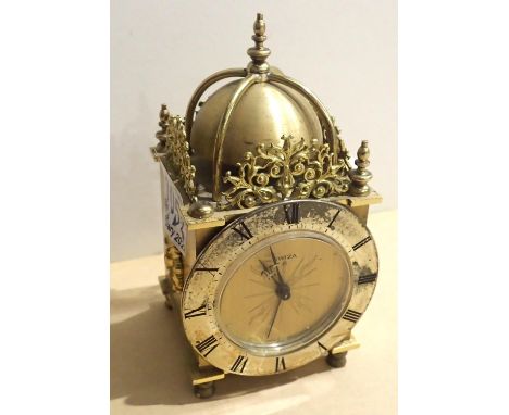 Vintage brass clockwork lantern clock. P&amp;P Group 2 (£18+VAT for the first lot and £3+VAT for subsequent lots) 