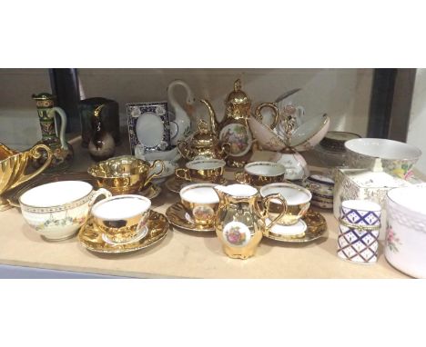 Shelf of mixed ceramics to include a tea set, floral bowl, etc. Not available for in-house P&amp;P, contact Paul O'Hea at Mai