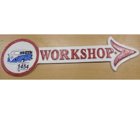 Cast Iron VW camper workshop arrow wall sign, L: 40 cm. P&amp;P Group 2 (£18+VAT for the first lot and £3+VAT for subsequent 