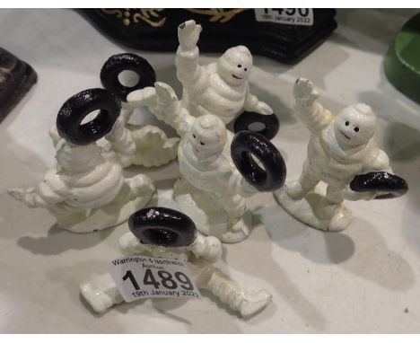 Six cast iron Michelin Man figurines, H: 5 cm. P&amp;P Group 1 (£14+VAT for the first lot and £1+VAT for subsequent lots) 