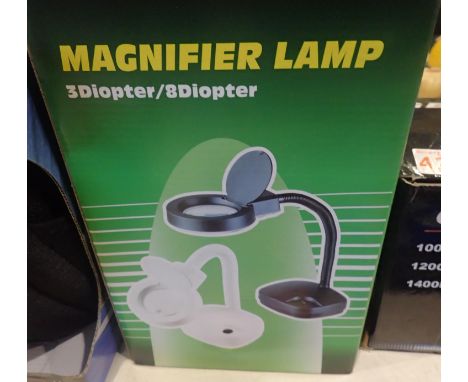 New old stock boxed magnifying lamp. P&amp;P Group 2 (£18+VAT for the first lot and £3+VAT for subsequent lots) 