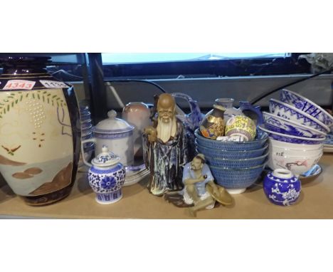 Shelf of Oriental ceramics to include to figurines lidded pots vases etc. Not available for in-house P&amp;P, contact Paul O'