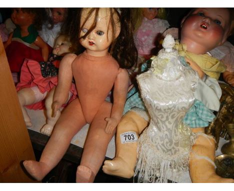 A quantity of vintage dolls.