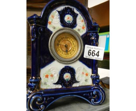 A ceramic mantel clock.