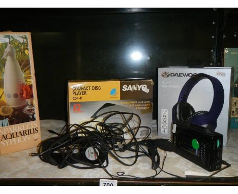 A compact disc player, headphones etc.,