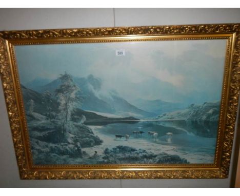 A good gilt framed print of Highland Cattle on a lake.