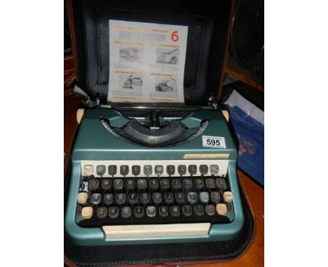 An Imperial Good Companion portable typewriter.