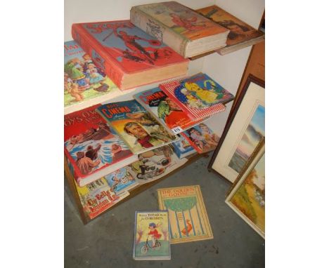 Three shelves of assorted vintage children's books.