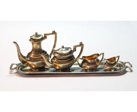 Silver miniature four-piece tea and coffee set with tray, Henry Matthews, Birmingham 1905, cased.&nbsp; CONDITION REPORT:&nbs