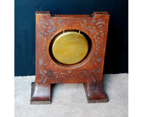 Tooled leather gong and stand, 68cm wide and 78cm high.&nbsp; CONDITION REPORT:&nbsp;Good condition.&nbsp; No hammer.&nbsp; G