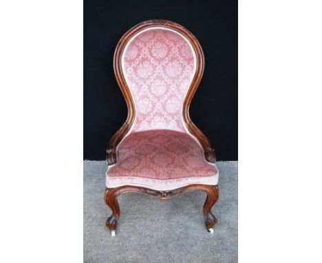 Victorian rosewood lady's chair with moulded frame, cushioned back and seat, cabriole legs and ceramic castors, 95cm high, 56