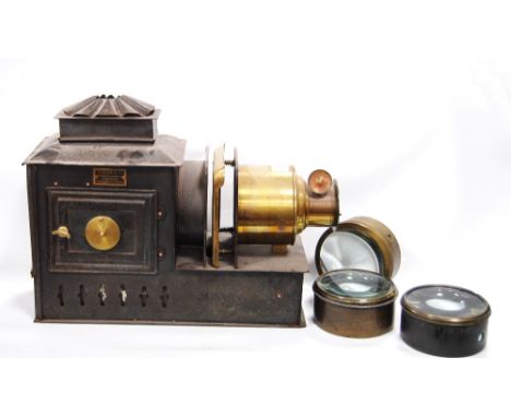 Magic lantern by Newton &amp; Co., 72 Wigmore Street, London, including three lenses. CONDITION REPORT: Full burner is presen