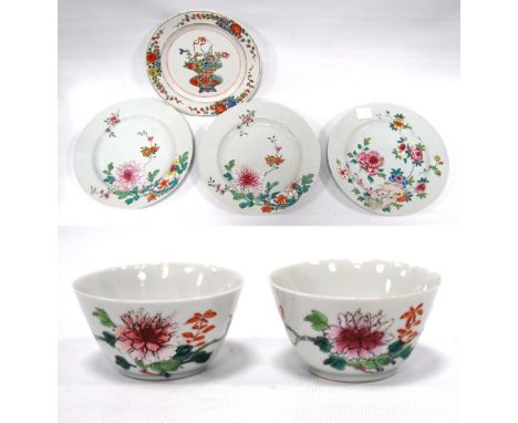 Set of three 19th century oriental dishes decorated with chrysanthemums and another, also a pair of tea bowls, 23cm diameter.