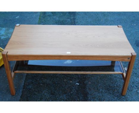 Ercol coffee table with rectangular top and glass shelf, 115cm wide, 50cm high and 57cm deep. 