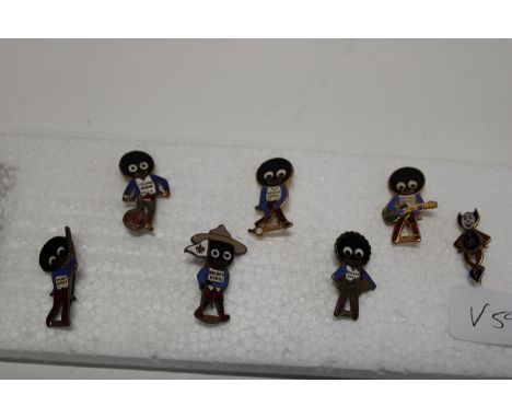 A selection of vintage Robertson's badges and one other 