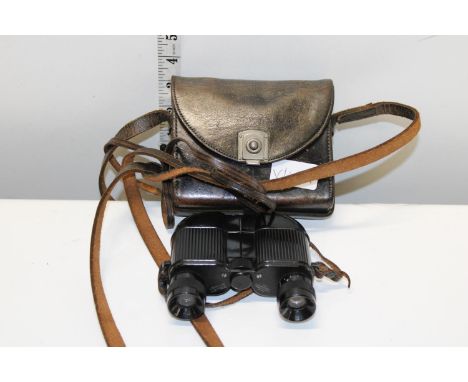 A pair of vintage Kershaw bakelite binoculars in original leather case 