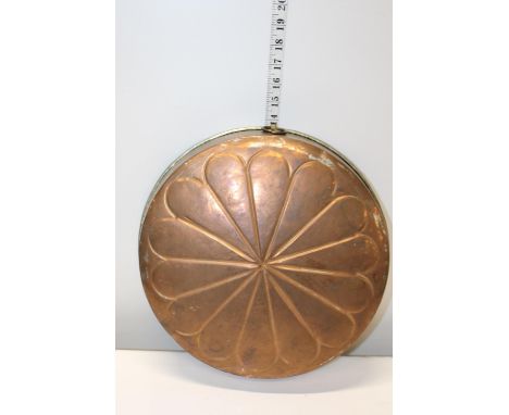 A large vintage copper mould 