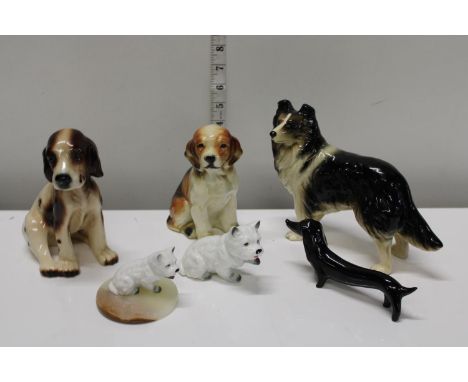 A selection of ceramic dog figurines 