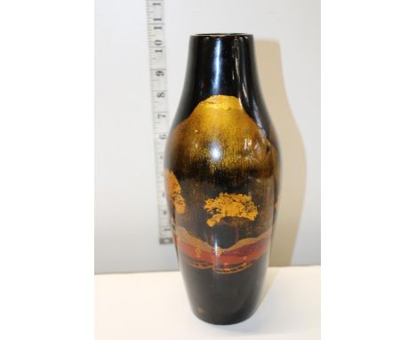 A vintage lacquered Oriental vase 