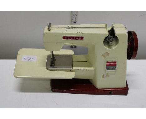 A vintage Vulcan countess child's sewing machine 