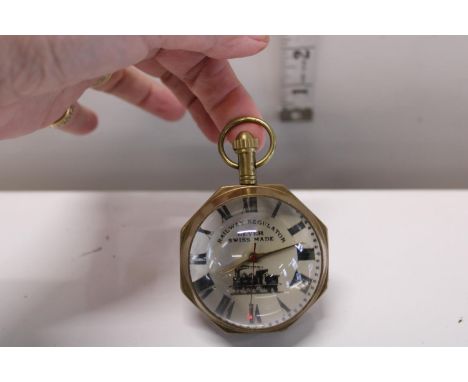 A manual wind Swiss made glass and brass railway regulator 
