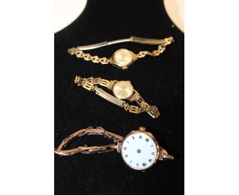 Three antique/vintage gold watches
