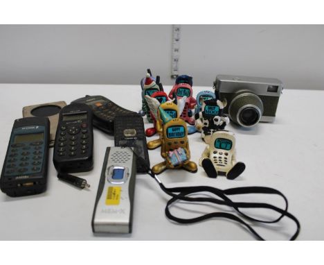 A selection of vintage mobile phones and other items 