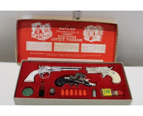 A vintage BCM Company miniature firearms set complete 