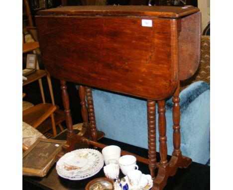 A 19th century Sutherland table on turned and bobbin supports