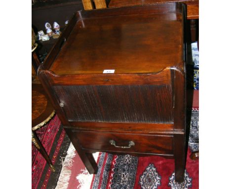 A Georgian mahogany commode with tambour front