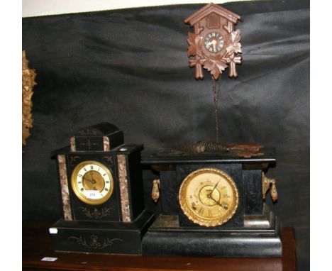 A Victorian slate and marble mantel clock, together with one other mantel clock and a cuckoo clock
