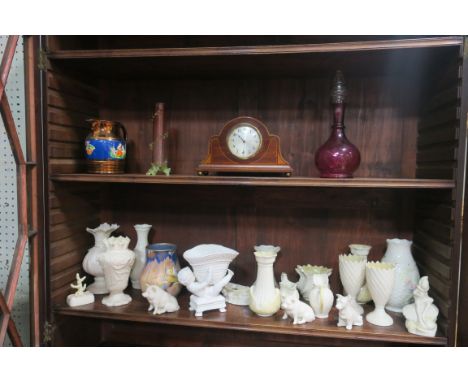 A MISCELLANEOUS COLLECTION including modern Belleek vases, a ruby glass decanter, a mahogany and marquetry inlaid mantle cloc