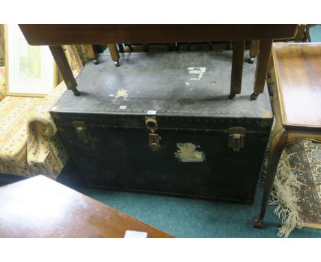 A SIMULATED LEATHER AND STEEL BOUND TRUNK,64cms x 100cms x 60cms.