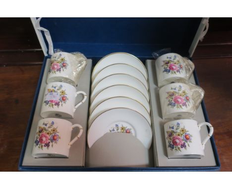 A CASED ROYAL WORCESTER COFFEE SET, together with contemporary world globe, porcelain model of a victorian lady, oriental pai