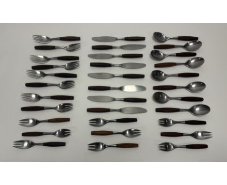 A mid-century thirty three piece Dansk (German) Fjord stainless steel flatware with teak handles comprising, eight spoons, ei