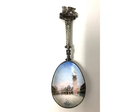 A Continental silver and enamel presentation spoon, with a Florentine style scene and a griffin finial, 87 g 