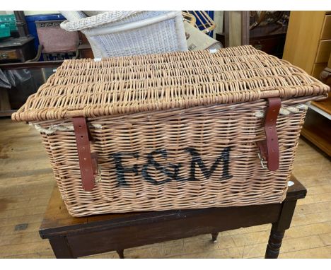 A walnut bureau, a wicker hamper stencilled F&M, a pine coffee table and assorted furniture (qty) 