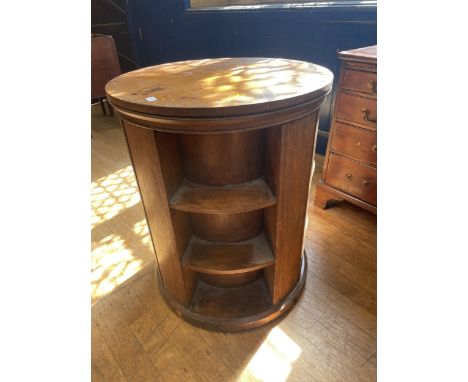 An oak revolving bookcase, 64 cm diameter, a tray top commode, another, two lamps and a triptych mirror (6) 