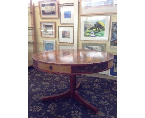 ROBERT HERITAGE (for Archie Shine): A mid 20th century Brazilian rosewood 'Hamilton' drum dining table with four integral dra