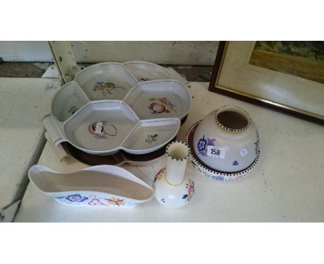 Two Poole Pottery hors d'oeuvres trays together with four other items.