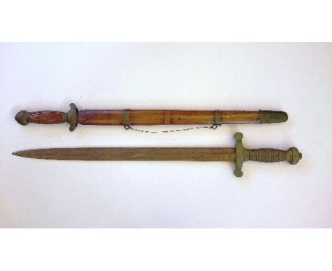 A Chinese short sword in wooden scabbard together with a French Military brass hilted sidearm.