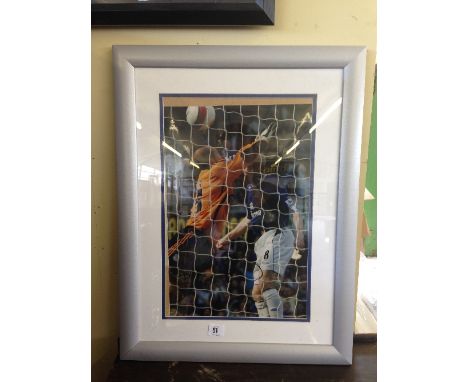 A framed colour photographic print depicting Andy Johnson scoring in the 2006 Merseyside Derby at Goodison Park, hand signed 